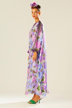 Purple kimono kaftan with floral pattern and geometric panel.
Components: 1
Type Of Work: Floral
Neckline: Boat
Sleeve Type: Flared
Fabric: Silk
Color: Purple
Other Details: 
Draped silhouette
Occasion: Resort - Aza Fashions Elegant Kaftan With Printed Motifs And Kimono Sleeves, Elegant Maxi Kaftan With Printed Motifs, Eid Long Sleeve Printed Kaftan, Silk Floral Print Floor-length Kaftan, Floor-length Silk Kaftan With Floral Print, Bohemian Floral Print Kaftan For Eid, Bohemian Floral Print Floor-length Kaftan, Floor-length Floral Silk Kaftan, Floor-length Floral Print Kaftan For Spring