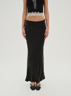 Chic and minimal, the Lena black maxi skirt exudes a sense of timelessness. Crafted in a silky cupro, this low rise skirt is cut on the bias, skimming the form and flaring out slightly at the hem. Low Rise Skirt, Black Maxi Skirt, Wedding Lingerie, Black Maxi, Skirt Black, New Shop, Low Rise, Maxi Skirt, Ready To Wear