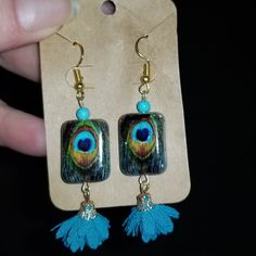 1.5 Inch Earrings Made With Hand Painted Peacock Beads, Turquoise Beads, And Adorable Blue Flower Dangles Gold Plated Brand New Peacock-colored Bohemian Earrings For Gift, Peacock Bohemian Earrings For Gift, Bohemian Peacock Earrings For Gift, Peacock Bohemian Earrings As Gift, Bohemian Peacock Earrings As Gift, Blue Bohemian Jewelry With Peacock Design, Bohemian Blue Jewelry With Peacock Design, Peacock Blue, Turquoise Beads