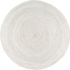 a white circular rug is shown on a white background with an oval pattern in the middle