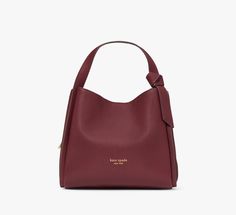 Crossbody or tote? Even better: both. This Knott bag gives you major versatility thanks to an optional and adjustable shoulder strap so you can carry it or sling it over your shoulder when you find your hands full. | Kate Spade Knott Medium Crossbody Tote, Cordovan Kate Spade Knott, Burgundy Purse, Large Shoulder Bags, Crossbody Tote, Pebbled Leather, Smooth Leather, Cross Body Handbags, Women's Accessories, Zip Pockets