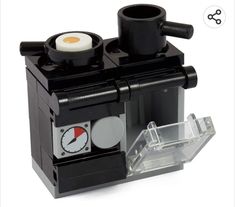 a lego coffee maker with an egg on top