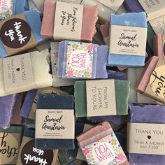 many different types of soaps are on display in a pile, with the words thank you so much written on them