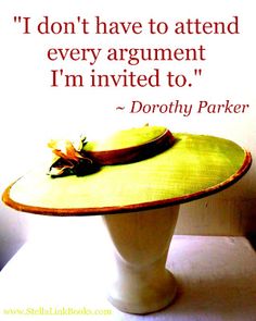 a yellow hat sitting on top of a white table next to a quote from dorothy parker