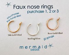 three pairs of gold filled nose rings on a white background with the words faux nose rings purchase 1, 2 or 3