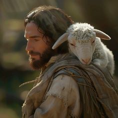 a man with a goat on his shoulder