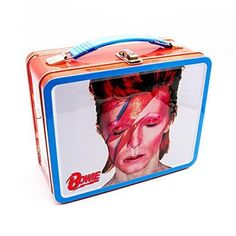 Return Policy Fast Delivery Trusted seller David Bowie Aladdin Sane Fun Box - Sturdy Tin Storage Box with Plastic Handle & Embossed Front Cover - Officially Licensed Merchandise & Collectible Gift Product Description UNIQUE GIFT FOR DAVID BOWIE FANS: This David Bowie themed box is created with the fan in mind, grab one for a family member, young and old, as a gift for their birthday, Christmas or any occasion RAISED EMBOSSED ART: The perfect David Bowie inspired collectible storage companion to take on the go or display proudly on the shelf at home. PERFECT STORAGE SIZE: Store your favorite merch, toys, collectibles, crafting accessories, trading cards, office supplies, or gift it to your friends and family 100% OFFICIALLY LICENSED DAVID BOWIE MERCHANDISE: All Fun Boxes are designed by , o Bowie Aladdin Sane, David Bowie Aladdin Sane, Tin Lunch Boxes, Aladdin Sane, Tin Storage, Craft Accessories, Disney Toys, Tin Boxes, Craft Storage