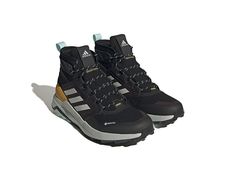 adidas Outdoor Terrex Trailmaker Mid GTX(r) - Men's Shoes : Core Black/Wonder Silver/Semi Flash Aqua : Make your way through rough terrain and embrace all of the challenges the great outdoors has to offer in the adidas Outdoor Terrex Trailmaker Mid GTX hiker. Mid top silhouette with full lace closure. Heel lock eyelets at top to provide additional support. Stitched pull loop at back for easy on and off. Textile and synthetic ripstop upper with abrasion-resistant overlays. GORE-TEX waterproof, breathable membrane. Light weight, removable textile insole. Traxion rubber outsole. Imported. Measurements: Weight: 1 lb Product measurements were taken using size 9, width D - Medium. Please note that measurements may vary by size. High Top Trainers, Mid Top, Shoes Adidas, Adidas Performance, Hiking Shoes, Gore Tex, Adidas Shoes, Great Outdoors, Product Reviews