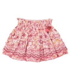 They'll want to wear tiered Ariel skirt from Poupette St Barth Kids all summer long. Made from floral challis, it has a smocked waistband and tasseled detailing. Pink Tiered Skirt With Elastic Waistband, Beach Cotton Skirt With Smocked Bodice, Beach Skirt With Smocked Bodice In Cotton, Beach Skirt With Smocked Bodice, Pink Tiered Bohemian Bottoms, Tiered Floral Print Beach Skirt, Flowy Tiered Bottoms For Beach, Flowy Tiered Beach Bottoms, Pink Tiered Skirt With Smocked Bodice