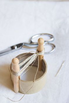 a pair of scissors sitting on top of a table