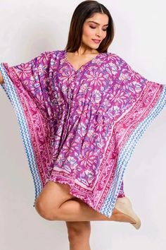 This boho caftan cover-up makes a great beach cover-up or comfy boho mini dress! Featuring a drawstring empire waist that can be worn relaxed or fitted, this short sleeve women's mini caftan with a v-neckline is made of breezy, lightweight, 100% soft Cotton in a fuchsia and purple floral print. This short boho caftan cover-up is so comfortable you can even wear it to sleep in! The material for this short caftan cover-up is artisan hand block-printed plus this caftan is fair trade and sustainably Boho Caftan, Short Boho, Cotton Caftan, Fair Trade Clothing, Purple Floral Print, Boho Mini Dress, Printed Tunic Tops, Block Dress, Caftan Dress