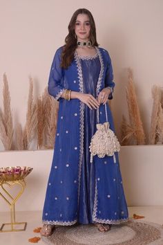 Blue long jacket with scallop trimmings and floral embroidery using gota patti work. Paired with an inner anarkali with embroidered neckline. - Aza Fashions Long Sleeve Gota Work Choli For Eid, Long Sleeve Choli With Gota Work For Eid, Blue Chanderi Nehru Jacket For Designer Wear, Front Open Anarkali Set With Dupatta For Eid, Anarkali Nehru Jacket With Zari Work For Reception, Diwali Anarkali Nehru Jacket In Chanderi, Wedding Outerwear With Dupatta For Eid, Festive Anarkali Nehru Jacket With Dabka Work, Blue Dabka Anarkali Set For Reception