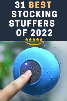 a hand is pressing the button on a blue ball that says, 20 amazing cool gadgets selling out in 2020