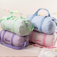 This enchanting Seersucker bag is a must-have for little travelers, dancers, and trendsetters alike. Crafted to combine style and durability, it's the perfect companion for sleepovers, dance classes, or as a stylish diaper bag. ✤ Colors: Pink, Blue, Purple, Green Please note that due to the many variations in monitors and browsers, actual colors may vary. ✤ Size: 17" x 9.5" x 9.5" It's roomy enough for all your kid's essentials. ✤ Seersucker Elegance: The Seersucker fabric combines charm with st Sparking Joy, Weekend Duffle Bag, Stylish Diaper Bag, Seersucker Fabric, Dance Classes, Dance Bag, Weekend Bag, Duffel Bag Travel, Overnight Bag