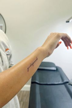 a woman's arm with a tattoo that reads, hope on it and the word faith written in cursive font