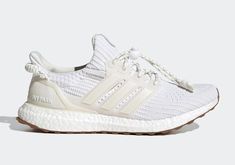 NEW IN BOX Ultraboost Ivy Park OG adidas tapped Beyoncé's athleisure brand to create the Ivy Park x UltraBoost 4.0 'White Gum.' The runner features a Primeknit construction on the upper, with the white base complemented by off-white on the Three-Stripes lacing cage and external heel counter, which sports Ivy Park branding. A drawcord lacing system secures the fit, while underfoot, a full-length Boost midsole provides cushioning, giving way to a gum rubber outsole for traction. Adidas Ultraboost White, Ivy Park Beyonce, Adidas Ivy Park, Athleisure Brands, Comfortable Running Shoes, Adidas Ultraboost, Ivy Park, Adidas Ultra Boost, Ultra Boost