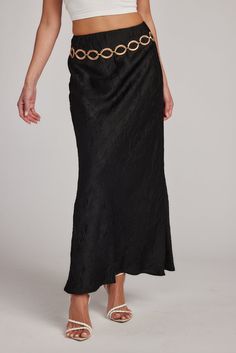 Now Trending: Mob Wife Era Black Satin Maxi Skirt, White Cropped Sweater, Crinkled Fabric, Black Cowboy Hat, Satin Maxi Skirt, Deodorant Stains, Satin Maxi, Festival Looks, Cowboy Hat