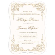 an ornate wedding card with gold foil on the front and bottom, in white paper