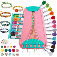 an assortment of crafting supplies including bracelets, beads and hair pins in a pink case