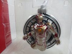 the iron man ornament is on display