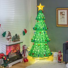 a christmas tree is lit up in the living room