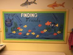 a bulletin board that says finding friends with fish and seaweed on the bottom half