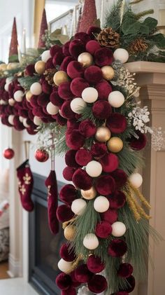 christmas garland hanging from the mantle in front of a fireplace