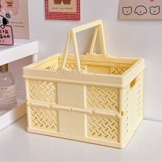 the plastic storage basket is shown with measurements for each item in front of it and on the wall