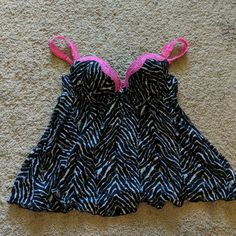 Excellent Condition , Never Worn. Hot Pink/ Zebra Print Lingerie Top. Size Medium, Underwire Bra. Back Clasps For Bra. The Front Has A Cute Heart Charm Between The Breasts. No Rips, Tears, Or Stains Black Underwire Camisole With Lined Body, Pink Underwire Sleepwear, Pink Heart Print Sleepwear For Summer, Cheap Pink Heart Print Sleepwear, Pink Flirty Sleepwear With Built-in Bra, Hot Pink Zebra Print, Pink Underwire Camisole With Built-in Bra, Pink Stretch V-neck Bra, Pink Zebra Print