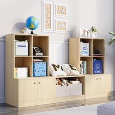 a living room with some bookshelves and toys on the shelves in front of it