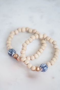 The Elliotborough Bracelet - TheTinyTassel White Wooden Beads Stretch Bracelet As Gift, White Stretch Bracelet With Wooden Beads For Gift, White Stretch Bracelet With Round Wooden Beads, White Wooden Beads Stretch Bracelet Gift, Traditional White Stretch Bracelet With Round Beads, Traditional White Round Bead Stretch Bracelet, White Bracelets With Round Wooden Beads, Traditional White Round Beads Stretch Bracelet, White Wooden Beads Jewelry For Meditation