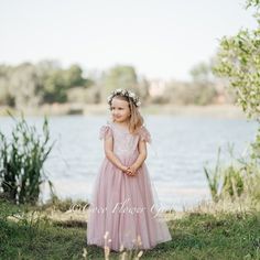 A new twist on our classic Flutter Dress.  Now with matching lace in the same colour as the tulle. Dusty Rose lace upper bodice with pretty soft floppy lace cap sleeves, long straight layered matching dusky rose pink tulle skirt and a beautiful crossed sheer patterned pretty lace back.  Perfect for one of our sashes to be added around the waist for a little more definition. Available in ages 12 months to 13 years Some sizes are being finished this week, please message if you wish to order to che Summer Lace Dress With Lace Bodice For Dress-up, Spring Lace Fairy Dress, Summer Lace Tutu Dress For Dress-up, Summer Tulle Dress With Flutter Sleeves, Pink Tulle Lace Dress With Lace Bodice, Pink Lace Bodice Tulle Dress, Pink Princess-style Tulle Lace Dress, Pink Princess Style Tulle Lace Dress, Pink Lace Dress With Lace Sleeves For Summer