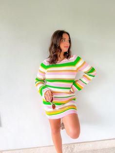 Get ready to embrace the sunshine, sip on refreshing margaritas, and have a blast in the Show Me Your Mumu Multi Rib Knit Away Mini Dress. This dress is perfect for all your summer adventures! It features a rib knit fabric that feels soft and stretchy, ensuring both comfort and style. The long sleeves and sweet tie front add a trendy touch to the mini length silhouette. With its green, pink, and yellow striped design, this dress is a vibrant and playful choice. The keyhole with tie straps on the Rib Knit Fabric, Summer Adventures, Show Me Your Mumu, Pink And Yellow, Yellow Stripes, Show Me Your, The Sunshine, Show Me, Stripes Design