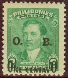 an old postage stamp with a man's face in green and white on it