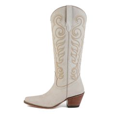 Embrace effortless Western elegance with these breathtaking boots. Crafted from buttery-soft suede in a dreamy, cloud taupe hue, they feature exquisite Western embroidery that adds a touch of authentic charm to the smooth, supple surface. The classic cowboy boot silhouette, with its pointed toe and stacked heel, provides both style and comfort. Perfect for dressing up or down, these versatile boots will become a go-to in your footwear collection. Express your awesome Western-inspired fashionista Whute Cowgirl Boots, Western White Boots Medium Width, Luxury White Snip Toe Cowboy Boots, White Weatern Boots, White Wide Calf Western Knee-high Boots, Jewlery Earrings, Western Embroidery, Leather Cowgirl Boots, Romper And Jacket