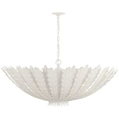 a white chandelier hanging from the ceiling