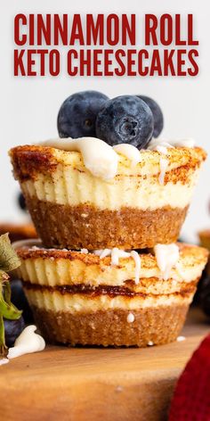 two blueberry cheesecakes stacked on top of each other with the words cinnamon roll keto cheesecakes