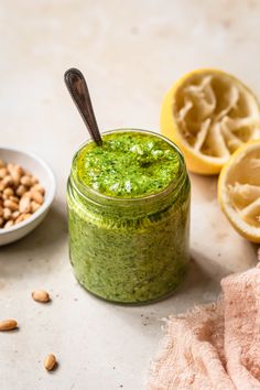 Pesto salad dressing in a small glass jar with a spoon in the dressing. Juiced lemons and toasted pine nuts in the background. Pumpkin Soup Healthy, Thai Pumpkin Soup, Healthy Nutella, Healthy Pesto