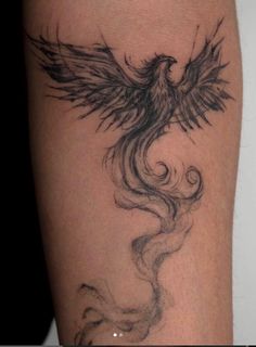 a black and white tattoo with a bird on it