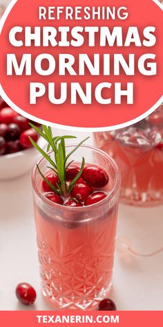 a glass filled with cranberry christmas morning punch on top of a white table