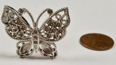 VINTAGE JEWELRY SUPPLIES, COMPONENTS & PIECES CABOCHONS, BEADS, CHARMS, RHINESTONES, CAMEOS, FINDINGS, CHAIN & MORE...   You Will Receive 1 (One) Silver Plated Metal Filigree Butterfly Unset Rhinestone Setting Cabochon Finding. Measures 24mm. High by 30mm. Wide (5mm. Gauge / Thickness) No Holes. Rhinestone Settings Approx. 2mm. to 4x7mm. New Unused Vintage Stock - NOS - New Old Stock. PLEASE MESSAGE ME IF YOU HAVE ANY QUESTIONS...  Shipping Information UNITED STATES&n Victorian Rhinestone Jewelry Gift, Victorian Rhinestone Jewelry For Gifts, Victorian Rhinestone Jewelry For Anniversary, Victorian Jewelry With Rhinestones For Anniversary, Victorian Silver Jewelry With Rhinestones, Beads Charms, Silver Butterfly, Lace Border, Bead Crafts