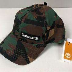 Timberland Hat Cotton Canvas Cap Camo Pattern Contrast Stitching Snapback Adjustment 6 Panel Design Timberland Printing & Badging Sized Os Brand New With Tags Pricing Is Fair And Quite Firm . Please Let Us Know If You Have Any Questions. Casual Camouflage Hat With Curved Brim, Casual Camouflage Hat With Curved Bill, Casual Camouflage Snapback Hat, Timberland Beanie, Black Timberlands, Camouflage Colors, Mens Cuff, Camo Hats, Watch Cap