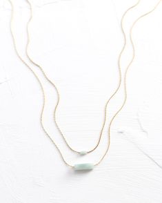 • Made With 14k Yellow Gold Filled or Sterling Silver Pieces • Features a 13mm or 4mm Genuine Amazonite Pendant • Available In 14”, 16”, 18”, 20”, 22” Lengths • These Stones Are Genuine; They Haven't Been Artificially Dyed or Altered. Minimalist Double Strand 14k Gold Necklace, Minimalist 14k Gold Double Strand Necklaces, Minimalist 14k Gold Double Strand Necklace, Minimalist Single Strand 14k Gold Filled Necklace, Minimalist 14k Gold Filled Single Strand Necklace, Minimalist Single Strand Necklaces For Layering, Minimalist Single Strand Jewelry For Layering, Solid Gold Earrings, Leather Cuffs Bracelet