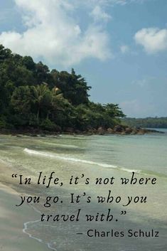 a quote on the beach that says, i'm life it's not where you go it's who you travel with