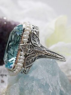 Aquamarine Ring, Sky Blue gem with Seed Pearl Frame, Silver Leaf Filigree, Victorian Jewelry D234 Leaf Filigree, Seed Pearl Ring, Antique Style Rings, Aquamarine Gem, Aquamarine Ring, Pearl Design, Sterling Silver Filigree, Aquamarine Rings, Blue Gems