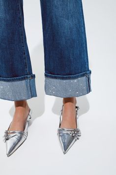 Introducing our Mid Wash Straight Leg Jeans - a classic denim essential reimagined with a touch of glamour. These jeans combine the timeless appeal of straight-leg denim with a unique folded hem adorned with sequins, making them a versatile choice for both party and casual wear. Chic Sequin Detailing: The eye-catching folded hem is enhanced with sparkling sequins, adding a festive and stylish touch to your outfit. Comfortable Stretch Denim: Crafted from a blend of 67% Cotton, 28% Polyester, 3% V Unique Jeans, Outfit Comfortable, Denim Essentials, High Waist Fashion, Denim Collection, Straight Leg Denim, Stretch Denim, Straight Leg Jeans, Leg Jeans