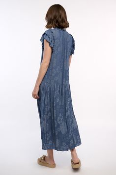 This jacquard maxi dress feels particularly breezy thanks to the dropped waist and shin-skimming pleats. Done in Parisian blue with a floral motif woven in, it's got a sweetly tied neckline, smocked detailing, and tiered short sleeves edged by picot stitching. "•Split neckline with self-tie •Relaxed fit •Ruffle trim •Short sleeves •Dropped waist •Pleated skirt �•Mid-length hem DIMENSIONS •Standard: 50 Length" Item number 2090410-1 100% Polyester Hand Wash Cold Blue Maxi Dress With Ruffle Hem For Daywear, Blue Tiered Maxi Dress For Daywear, Casual Blue Dress With Pleated Hem, Parisian Blue, Floral Jacquard, Drop Waist, Ruffle Trim, Floral Motif, Item Number