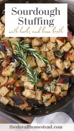 a skillet filled with stuffing and topped with fresh rosemary garnish on top