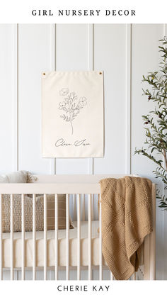 Personalized canvas flag with delicate flower sketch and custom name, hanging above a crib in a girl's nursery. Ideal for girl nursery decor, baby room wall art, and custom name signs for a cozy, stylish baby girl's room. Baby Tate, Name Wall Hanging, Name Flag, Canvas Flag, Pooh Nursery, Winnie The Pooh Nursery, Flower Sketch, Name Canvas, Nursery Name Sign