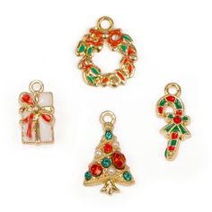 Any of these charms will be a perfect addition to your favorite charm bracelet or use one to make a necklace for yourself and 3 of your friends! Each charm is adorned with enamel or sprakle or a little of both! In this charm set you will receive the following: 11x7mm Enamel Present Charm 18x15mm Enamel Wreath Charm 8.5x20mm Enamel Candy Cane Charm 20x12mm Sparkle Tree Made with zinc alloy, brass, glass, and enamel. Enamel Dangling Charms For Jewelry Making, Nickel-free Green Charms For Gifts, Nickel Free Enamel Charms For Jewelry Making, Enamel Dangling Charms For Gifts, Nickel-free Enamel Charms For Jewelry Making, Green Charms With Lobster Clasp For Gift, Green Pendant Charms For Gifts, Pendant Charms With Removable Features For Gifts, Pendant Charms With Removable Features As Gifts